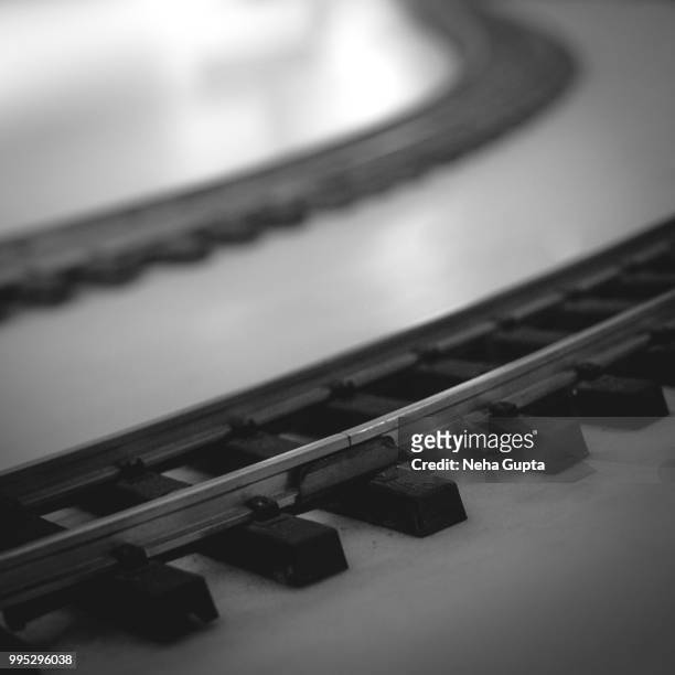toy train tracks - monochrome - neha gupta stock pictures, royalty-free photos & images