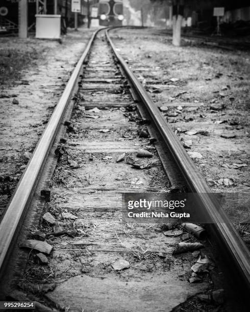 train track - monochrome - neha gupta stock pictures, royalty-free photos & images