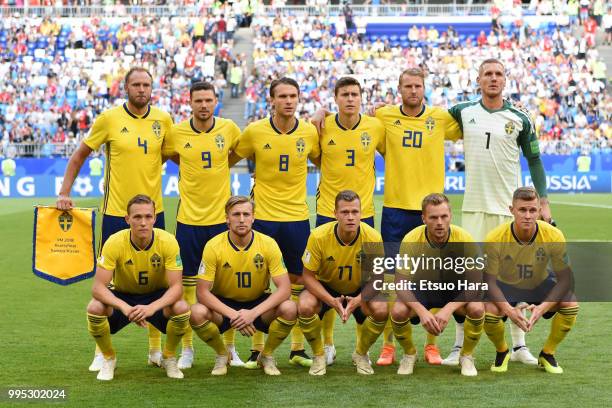 Players of Sweden line up for team photos prior to the 2018 FIFA World Cup Russia Quarter Final match between Sweden and England at Samara Arena on...