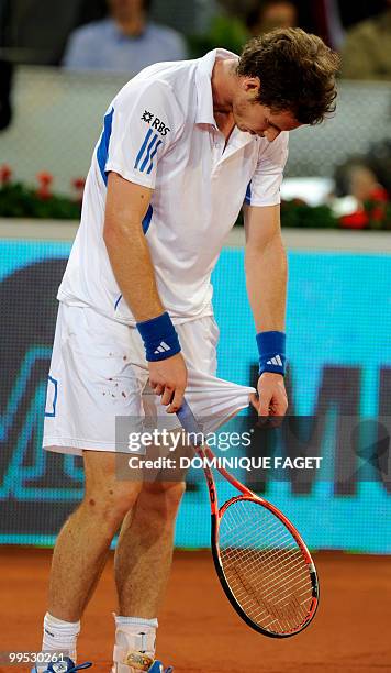 British Andy Murray reacts during his match against Spanish David Ferrer during the Madrid Masters tennis on May 14, 2010 at the Caja Magic sports...