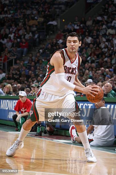 Carlos Delfino of the Milwaukee Bucks looks to pass the ball against the Boston Celtics on March 9, 2010 at the Bradley Center in Milwaukee,...