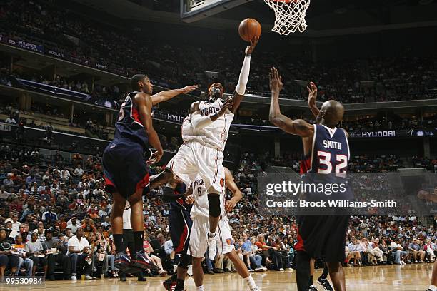 Gerald Wallace of the Charlotte Bobcats makes a layup against the Atlanta Hawks during the game on April 6, 2010 at the Time Warner Cable Arena in...
