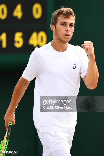 Hugo Gaston of France celebrates a point during his Boys' Singles second round match on day eight of the Wimbledon Lawn Tennis Championships at All...