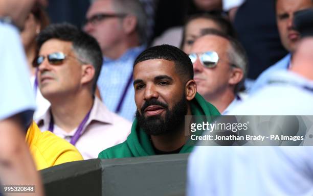 Drake in the stands of centre court watching Serena Williams in action on day eight of the Wimbledon Championships at the All England Lawn Tennis and...
