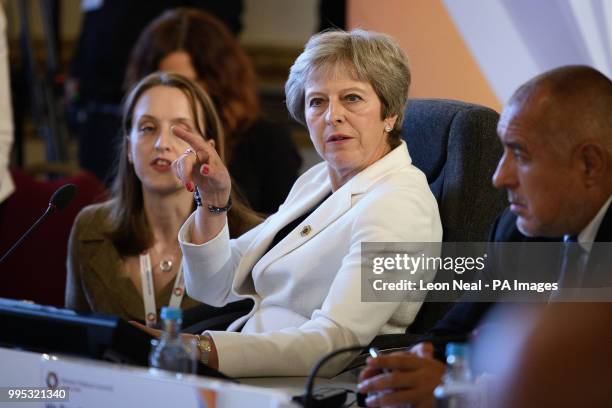 Prime Minister Theresa May leads a plenary session during the second day of Western Balkans summit at Lancaster House, London.