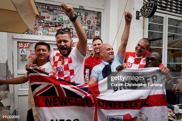 England fans sing songs with Croatian fans in a bar in Nikolskaya St near Red Square ahead of the World Cup semi-final game between England and...