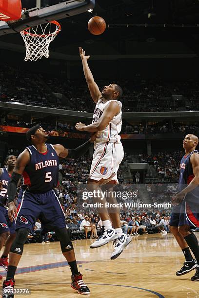 Boris Diaw of the Charlotte Bobcats puts a shot up against the Atlanta Hawks during the game on April 6, 2010 at the Time Warner Cable Arena in...