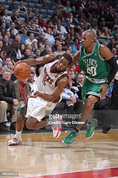 John Salmons of the Milwaukee Bucks looks to move against Ray Allen of the Boston Celtics on March 9, 2010 at the Bradley Center in Milwaukee,...