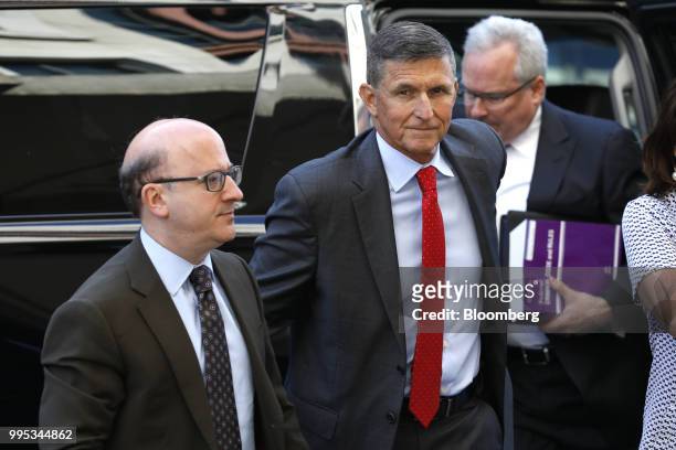 Michael Flynn, former U.S. National security advisor, center, arrives for a status hearing at federal court in Washington, D.C., U.S., on Tuesday,...
