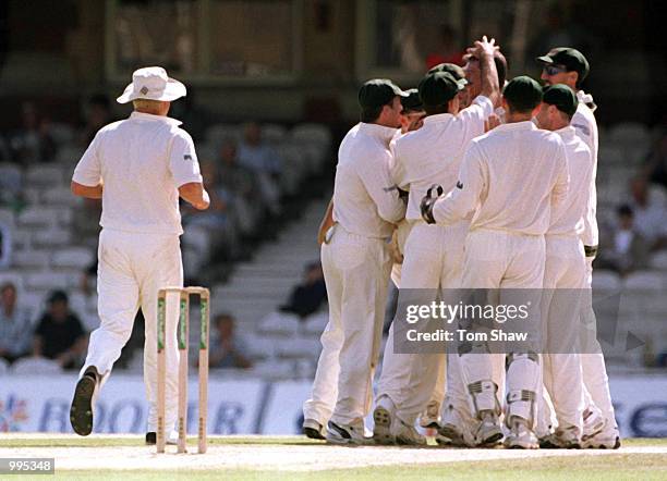 Australia celebrates the wicket of Marcus Trescothick of England during the 5th day of the 5th Ashes Test between England and Australia at The AMP...