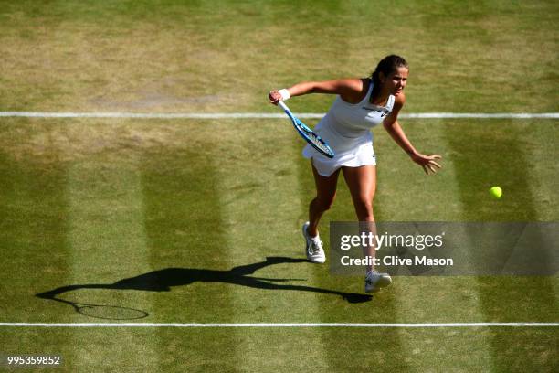 Julia Goerges of Germany plays a backhand slice against Kiki Bertens of the Netherlands during their Ladies' Singles Quarter-Finals match on day...