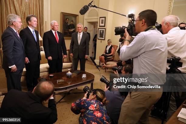 Senate Majority Leader Mitch McConnell , Judge Brett Kavanaugh, Vice President Mike Pence and former Sen. Jon Kyl pose for photographs before a...