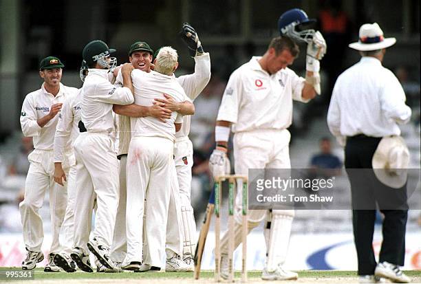 Australia celebrates the wicket of Alec Stewart of England during the 5th day of the 5th Ashes Test between England and Australia at The AMP Oval,...