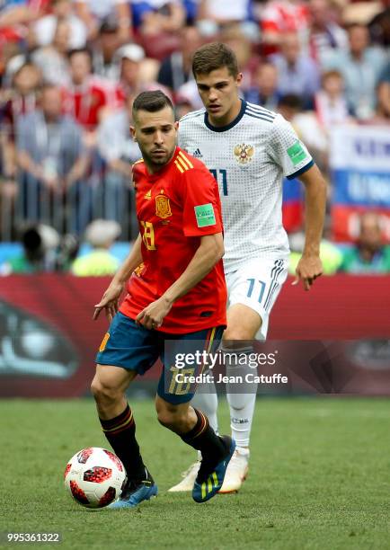 Jordi Alba of Spain, Roman Zobnin of Russia during the 2018 FIFA World Cup Russia Round of 16 match between Spain and Russia at Luzhniki Stadium on...