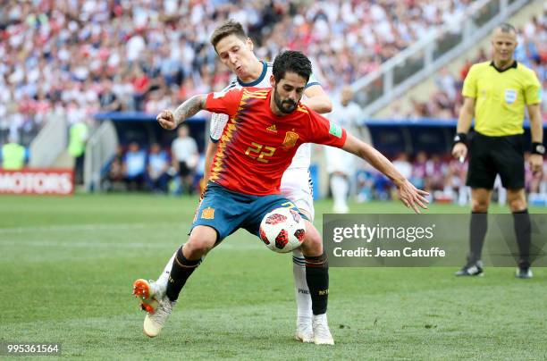 Isco of Spain, Daler Kuzyayev of Russia during the 2018 FIFA World Cup Russia Round of 16 match between Spain and Russia at Luzhniki Stadium on July...