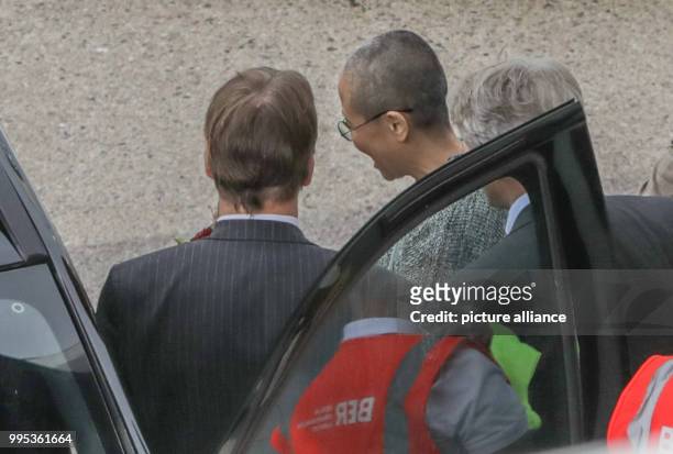 July 2018, Germany, Berlin: Liu Xia, widow of the Nobel Peace Prize laureate, Liu Xiaobo, has landed at Berlin Tegel airport and is picked up by car...
