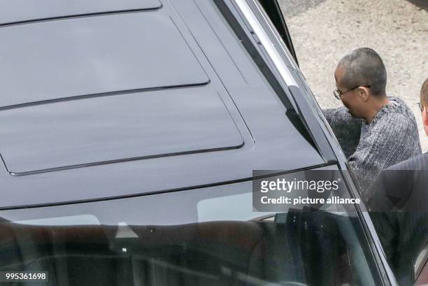 July 2018, Germany, Berlin: Liu Xia, widow of the Nobel Peace Prize laureate, Liu Xiaobo, has landed at Berlin Tegel airport and is picked up by car...