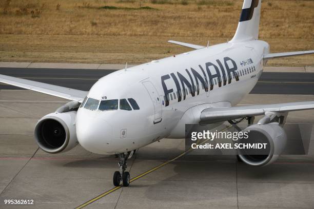 Finnair plane believed to have Liu Xia, the widow of Chinese Nobel Peace Prize laureate Liu Xiaobo, onboard arrives from Helsinki at Tegel Airport in...