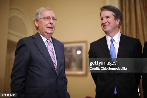 Senate Majority Leader Mitch McConnell makes brief remarks before meeting with Judge Brett Kavanaugh in McConnell's office in the U.S. Capitol July...