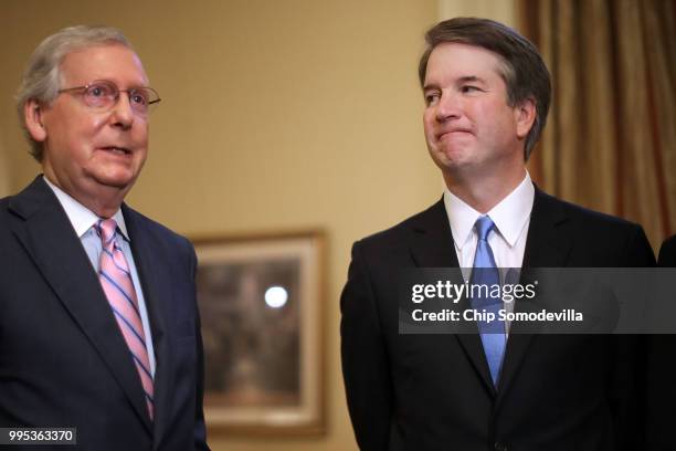 Senate Majority Leader Mitch McConnell makes brief remarks before meeting with Judge Brett Kavanaugh in McConnell's office in the U.S. Capitol July...