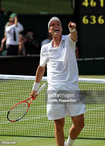 Tomas Berdych of the Czech Republic celebrates after beating Roger Federer of Switzerland in the Mens Singles Quarter Final on day nine of the 2010...