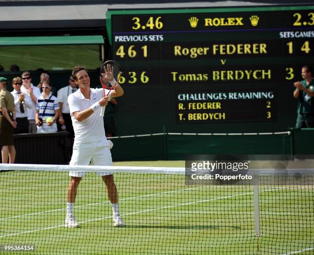 Tomas Berdych of the Czech Republic celebrates after beating Roger Federer of Switzerland in the Mens Singles Quarter Final on day nine of the 2010...