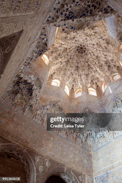 The dome of the Sala de los Abencerrajes in the Alhambra, a 13th century Moorish palace complex in Granada, Spain. Built on Roman ruins, the Alhambra...