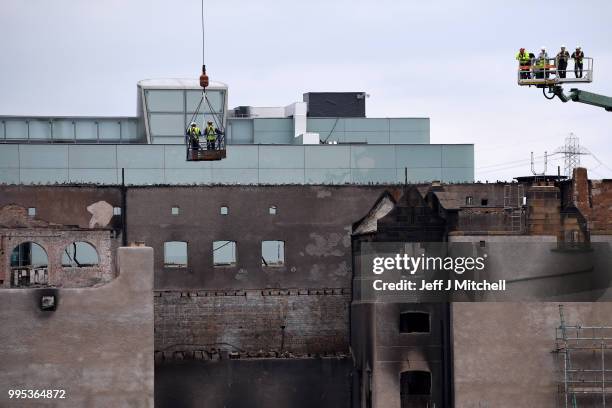 Workers begin the demolition of the burnt-out Glasgow Art School on July 10, 2018 in Glasgow, Scotland. The grade A listed building was undergoing a...