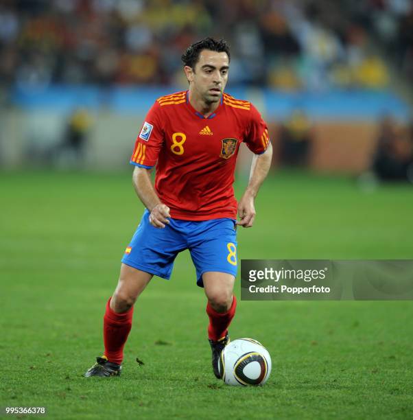 Xavi of Spain in action during the FIFA World Cup Semi Final between Germany and Spain at the Moses Mabhida Stadium on July 7, 2010 in Durban, South...