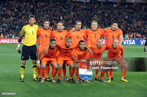 The Netherlands team line up for a group photo before the FIFA World Cup Final between the Netherlands and Spain at the Soccer City Stadium on July...