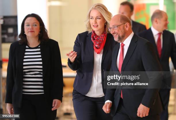 The SPD's defeated chancellor canidate Martin Schulz with with Manuela Schwesig , the premier of the state of Mecklenburg-Western Pomerania, and...