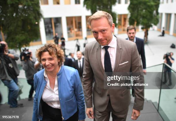 Christian Lindner, the leader and top candidate of the liberal FDP party, and Nicola Beer, the party's general secretary, attend the federal press...