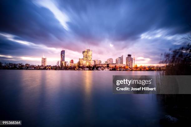 vienna skyline at alte donau #2 - alte fotos stockfoto's en -beelden