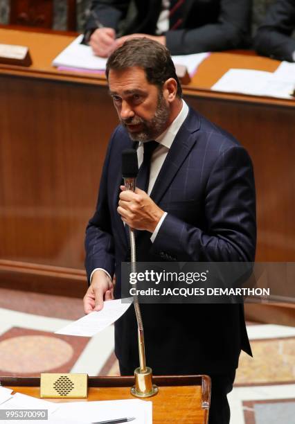 French Junior Minister for the Relations with Parliament Christophe Castaner speaks during a session of questions to the government at the National...