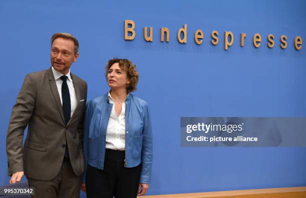 Christian Lindner, the leader and top candidate of the liberal FDP party, and Nicola Beer, the party's general secretary, attend the federal press...