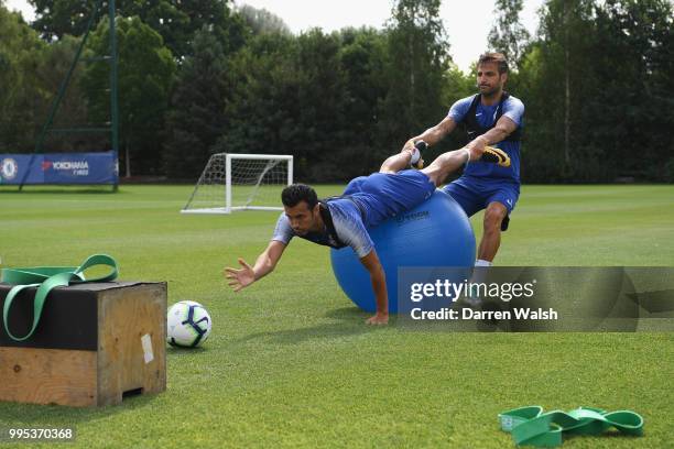 Pedro and Cesc Fabregas of Chelsea during a training session at Chelsea Training Ground on July 10, 2018 in Cobham, England.