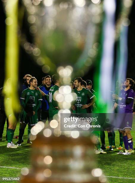 Cup winners Bentleigh Greens gather in front of the cup during the end of the NPL Dockerty Cup match between Heidelberg United and Bentleigh Greens...