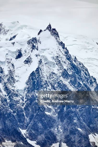 aiguille du midi summit, peak, snow-capped - aiguille du midi stock-fotos und bilder