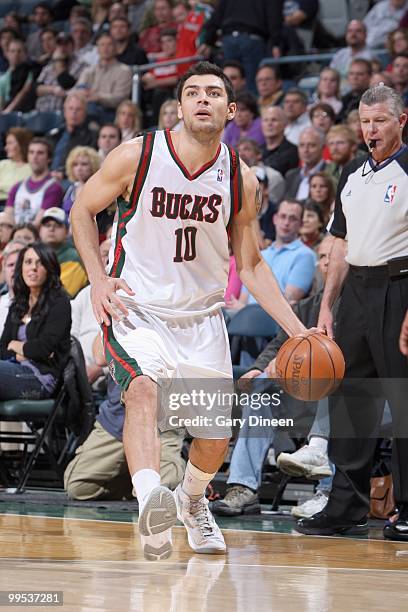 Carlos Delfino of the Milwaukee Bucks drives the ball against the Phoenix Suns on April 3, 2010 at the Bradley Center in Milwaukee, Wisconsin. NOTE...