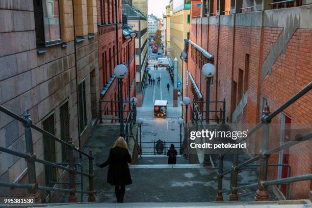 eine treppe in der stadt von stockholm, schweden - petekarici stock-fotos und bilder