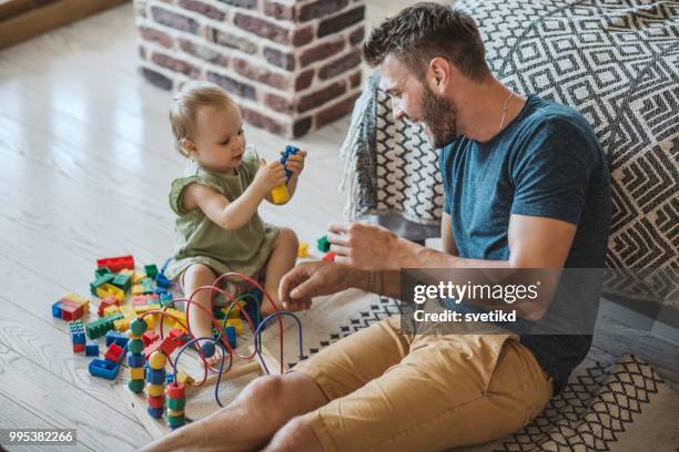 father and daughter spend time together at home - father time stock pictures, royalty-free photos & images