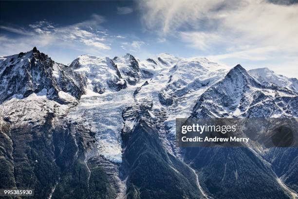 french alps mountain range with snow line. mont blanc summit, glaciers, chamonix valley and blue sky - pinnacle imagens e fotografias de stock