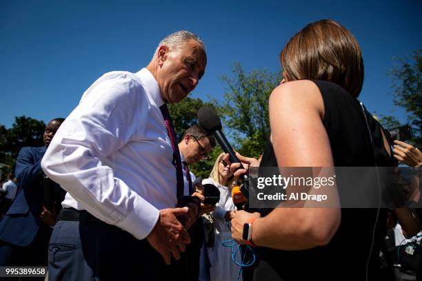 Senate Minority Leader Chuck Schumer D-N.Y.) speaks with MSNBC reporter Kasie Hunt, following a news conference to "save women's reproductive rights...