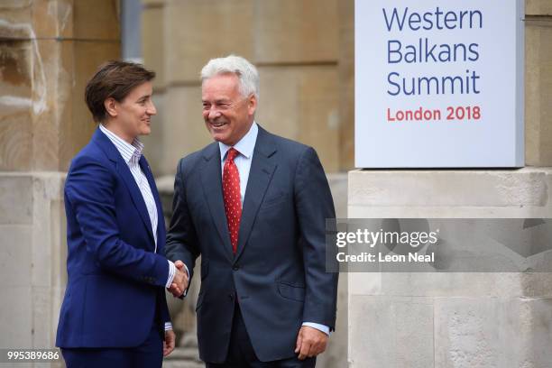 Serbia's Prime Minister Ana Brnabic is greeted by Britain's Minister of State for Europe and the Americas Alan Duncan ahead of the Western Balkans...