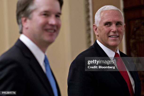 Vice President Mike Pence and Brett Kavanaugh, U.S. Supreme Court associate justice nominee for U.S. President Donald Trump, left, walk through the...