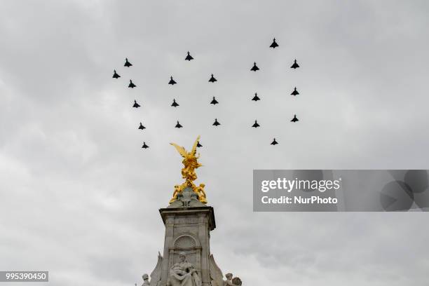 Militar aircrafts fly over The Mall and Buckingham palace as part of the celebration for the 100th anniversary of the Royal Air Force, London on July...