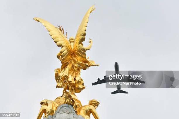 Militar aircrafts fly over The Mall and Buckingham palace as part of the celebration for the 100th anniversary of the Royal Air Force, London on July...