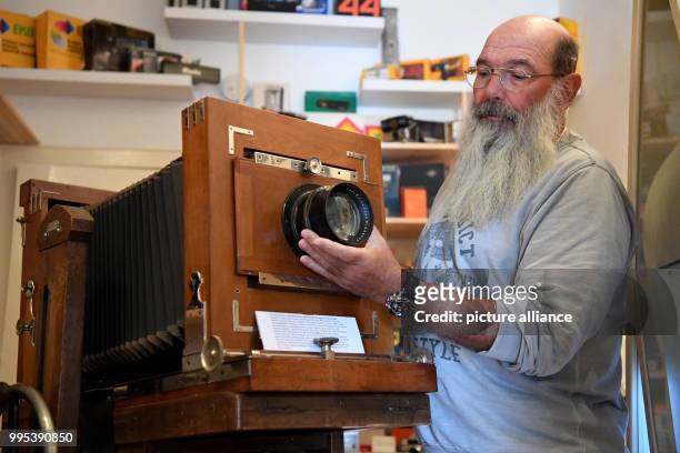 Andreas Lorenz can be seen with a Goerlitz camera capentry 'Ernst Herbst und Firl' from 1890 in one of the showrooms of his 'Kamu'-Museum in...