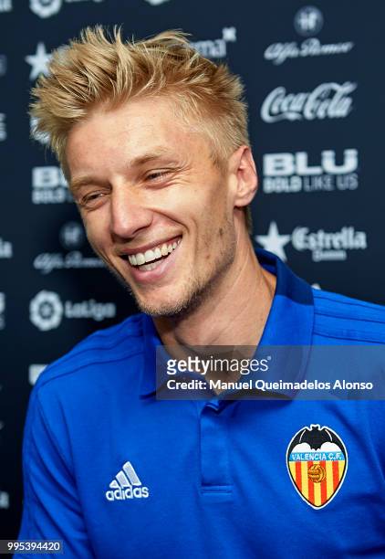 Daniel Wass faces the media during his presentation as a new player for Valencia CF at Paterna Training Centre on July 10, 2018 in Valencia, Spain.