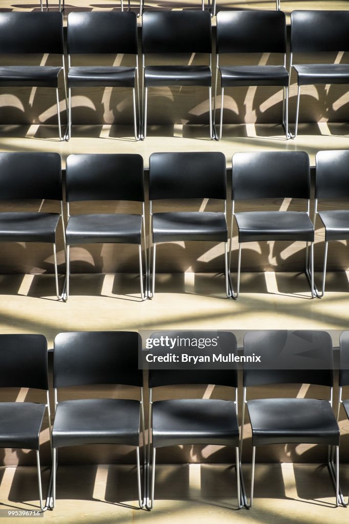 Rows of Empty Chairs in a Meeting Hall